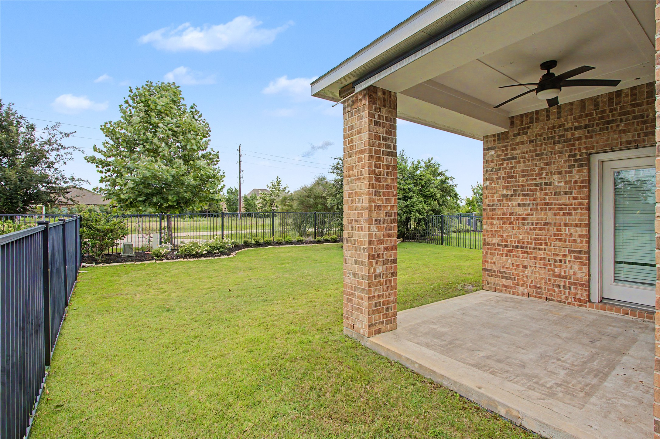19718 Shinnery Ridge Court Cypress, TX 77433 - Photo 19 of 23 a view of a house with backyard and a tree