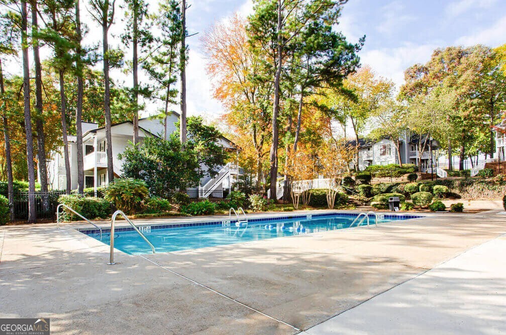 1173 North Hairston Road, Unit 2802 Stone Mountain, GA 30083 - Photo 25 of 31 a view of a park with bench and trees