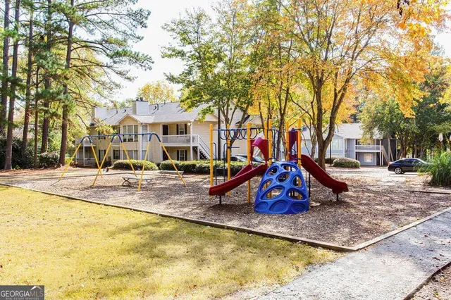 a view of a swimming pool with an outdoor space