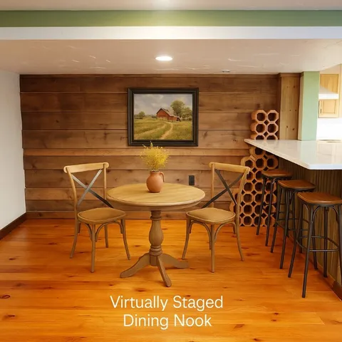 a view of a chairs and table in th patio