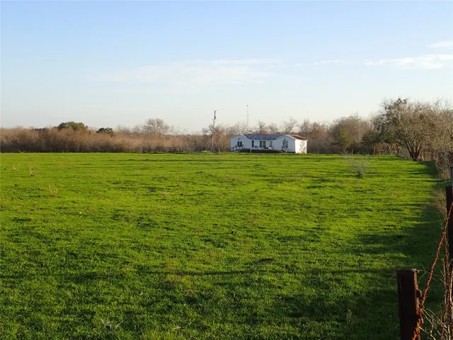 a view of an ocean from a yard