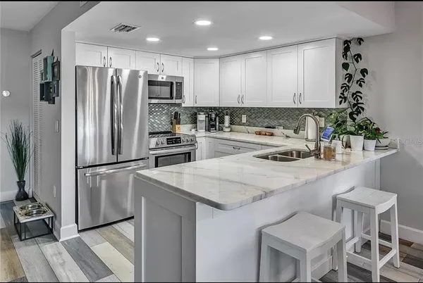 $4,000 | 661 Poinsettia Avenue, Unit 104, Clearwater Beach, FL 33767