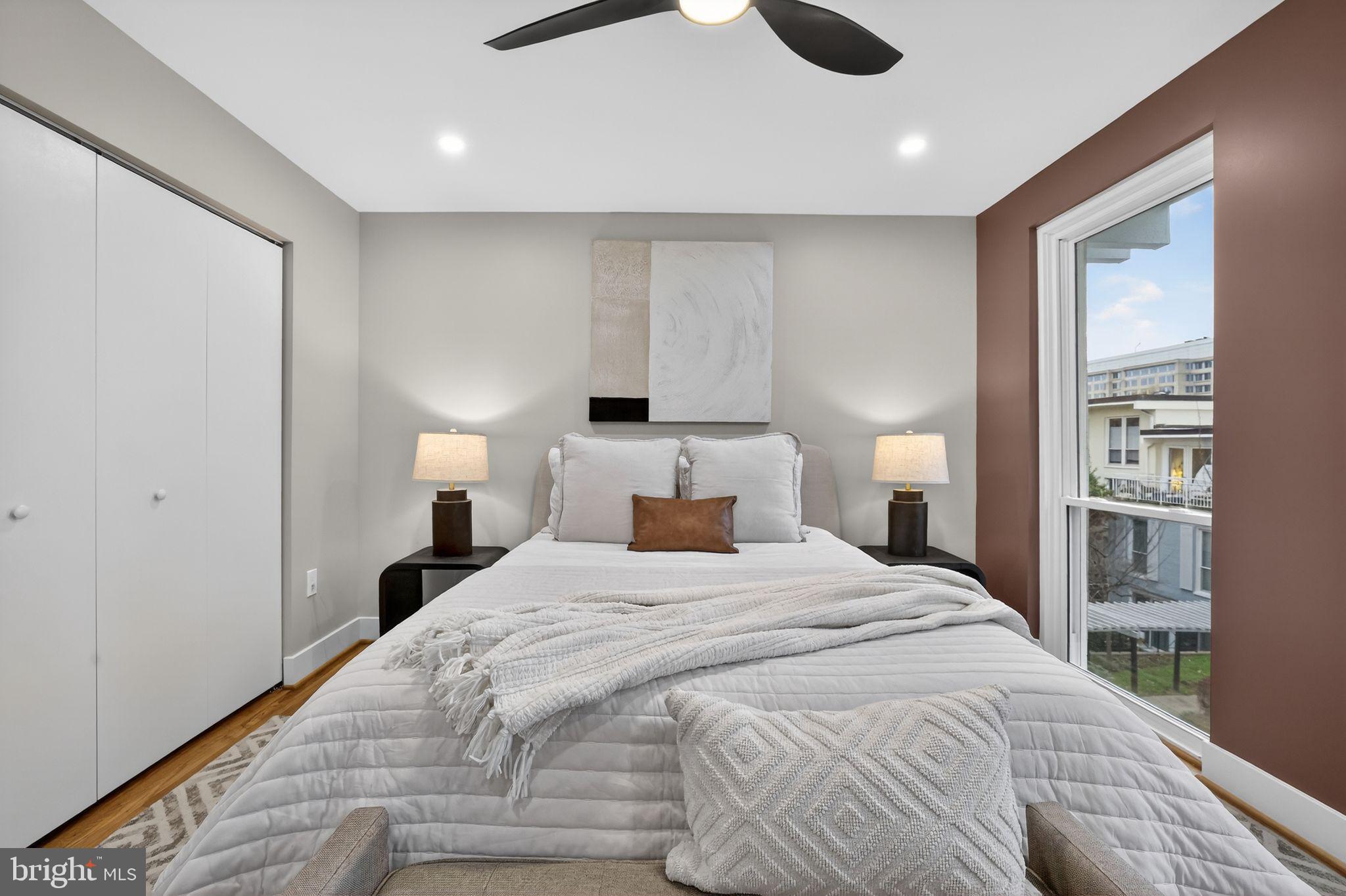 205 G Street Southwest, Unit 145 Washington, DC 20024 - Photo 29 of 46 Modern bedroom with natural light and style.