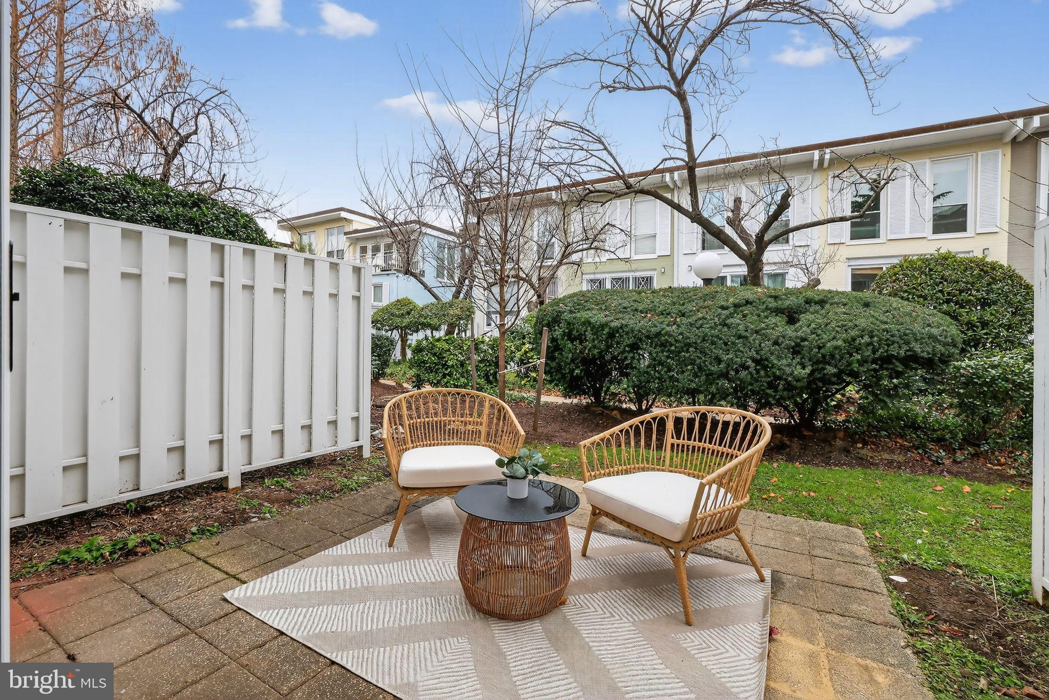 205 G Street Southwest, Unit 145 Washington, DC 20024 - Photo 33 of 46 Charming outdoor retreat with cozy seating.