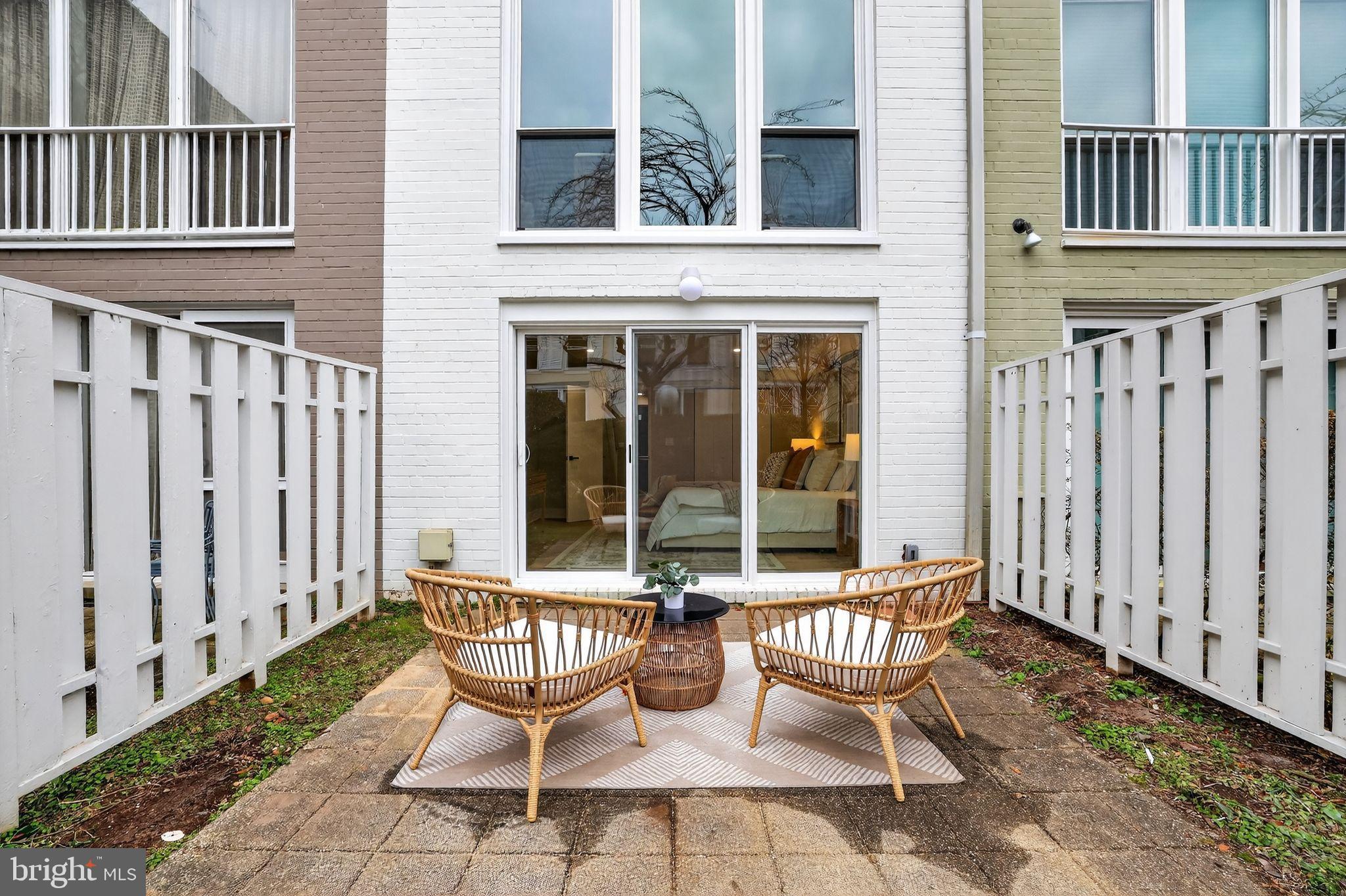 205 G Street Southwest, Unit 145 Washington, DC 20024 - Photo 34 of 46 Charming patio retreat with cozy seating.