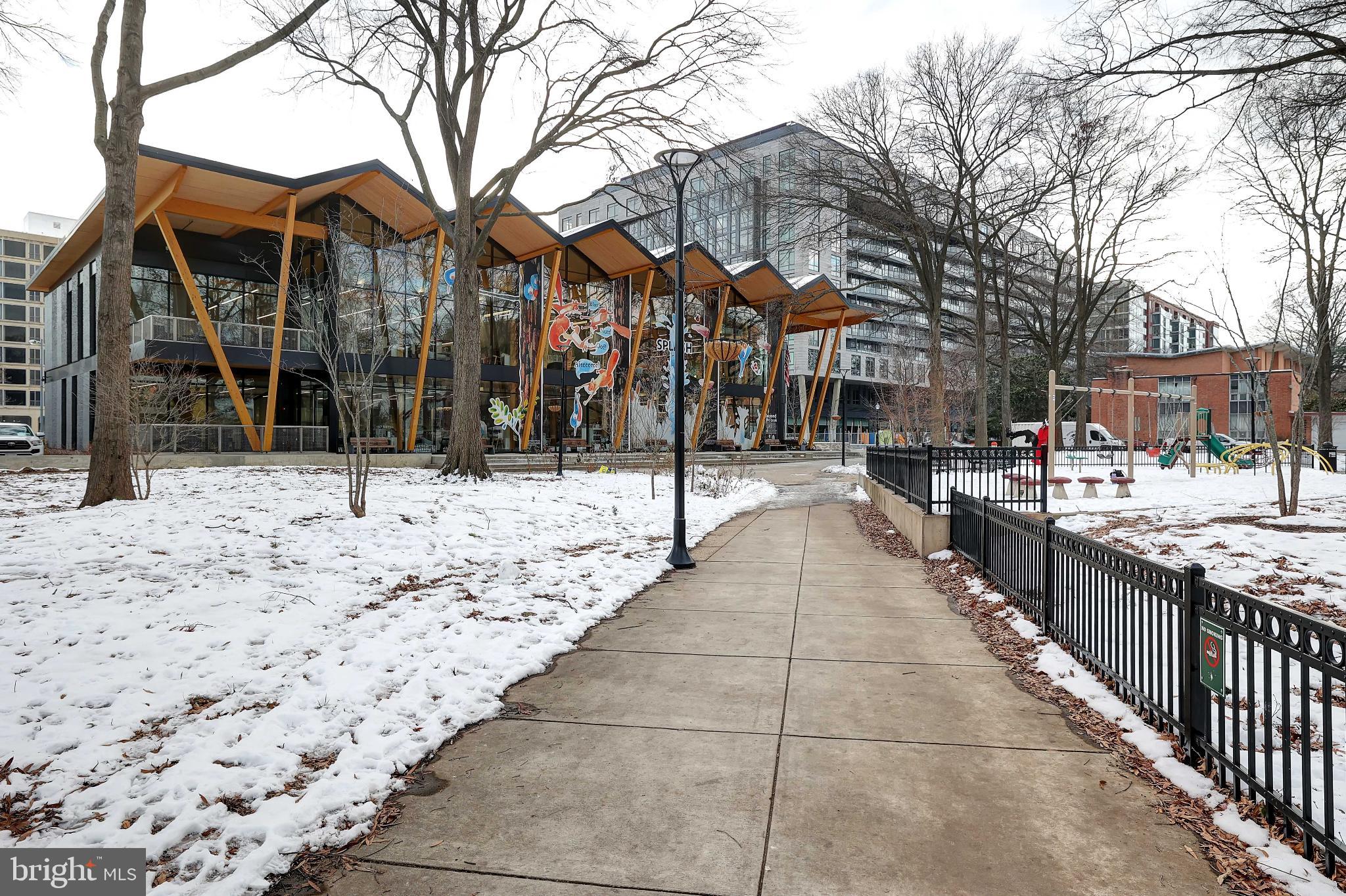 205 G Street Southwest, Unit 145 Washington, DC 20024 - Photo 39 of 46 Modern architecture amidst a snowy landscape.