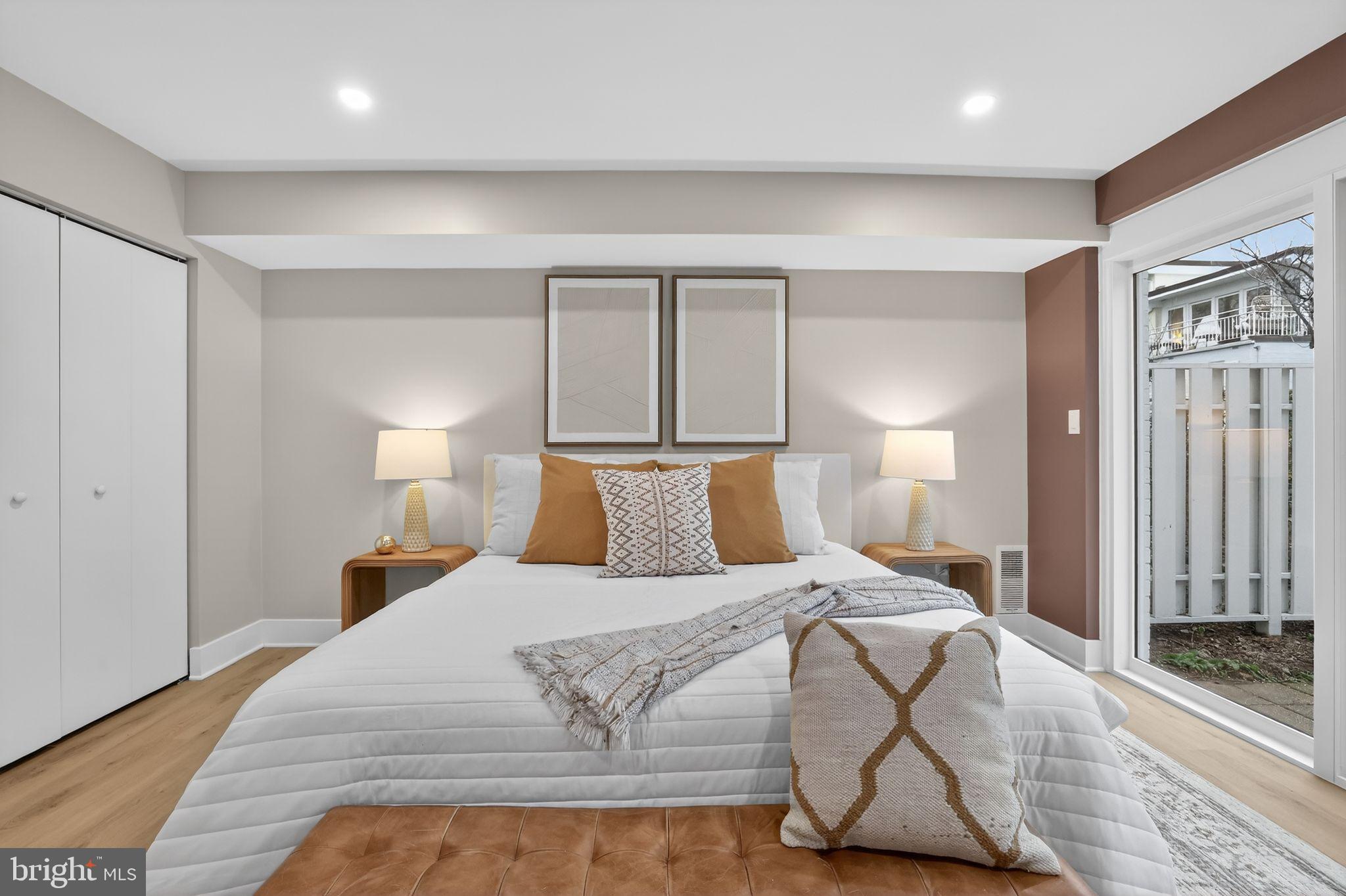 205 G Street Southwest, Unit 145 Washington, DC 20024 - Photo 4 of 46 Serene bedroom with natural light and style.