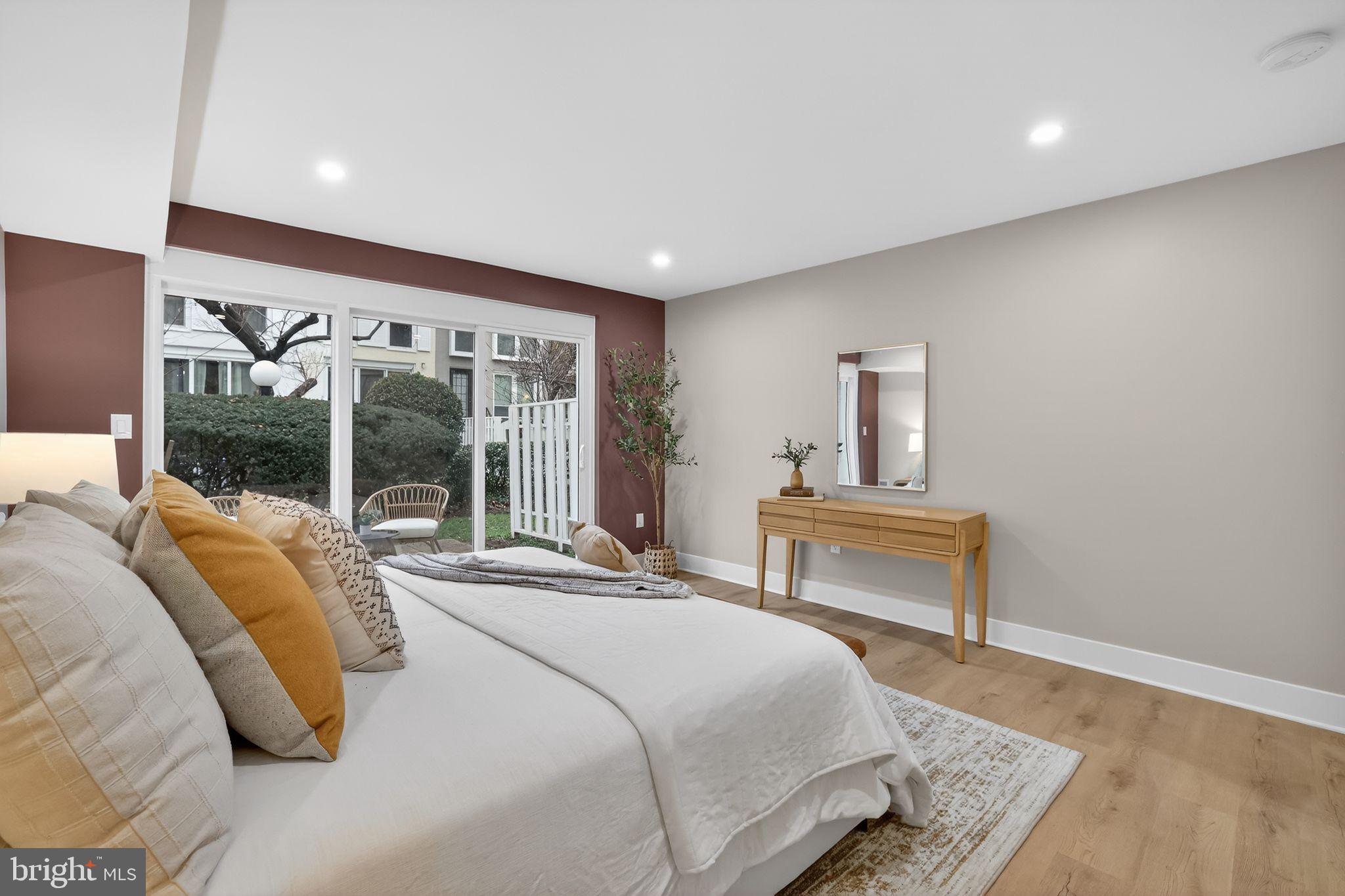 205 G Street Southwest, Unit 145 Washington, DC 20024 - Photo 5 of 46 Serene bedroom with garden view.