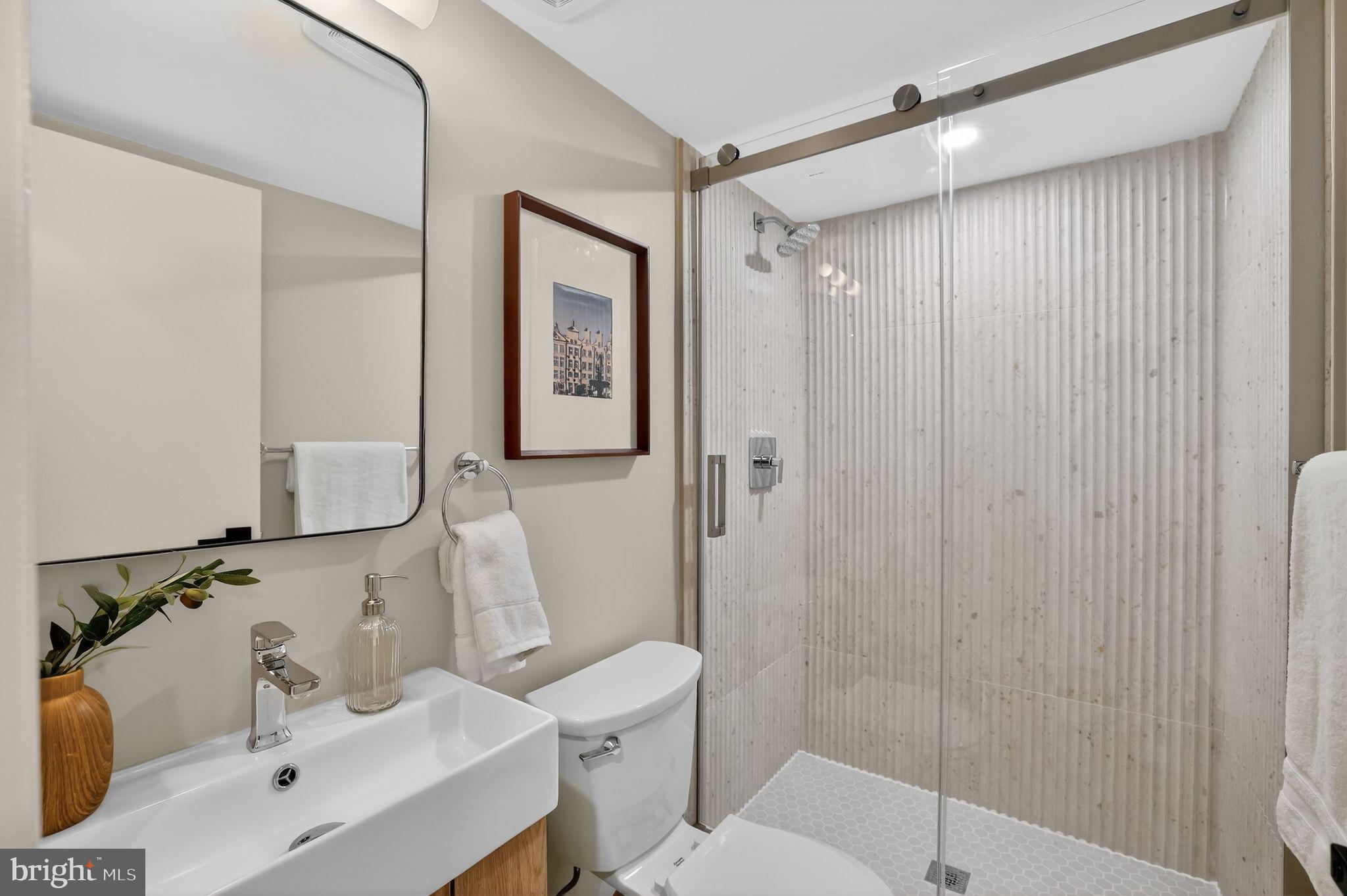 205 G Street Southwest, Unit 145 Washington, DC 20024 - Photo 8 of 46 Sleek modern bathroom with elegant finishes.