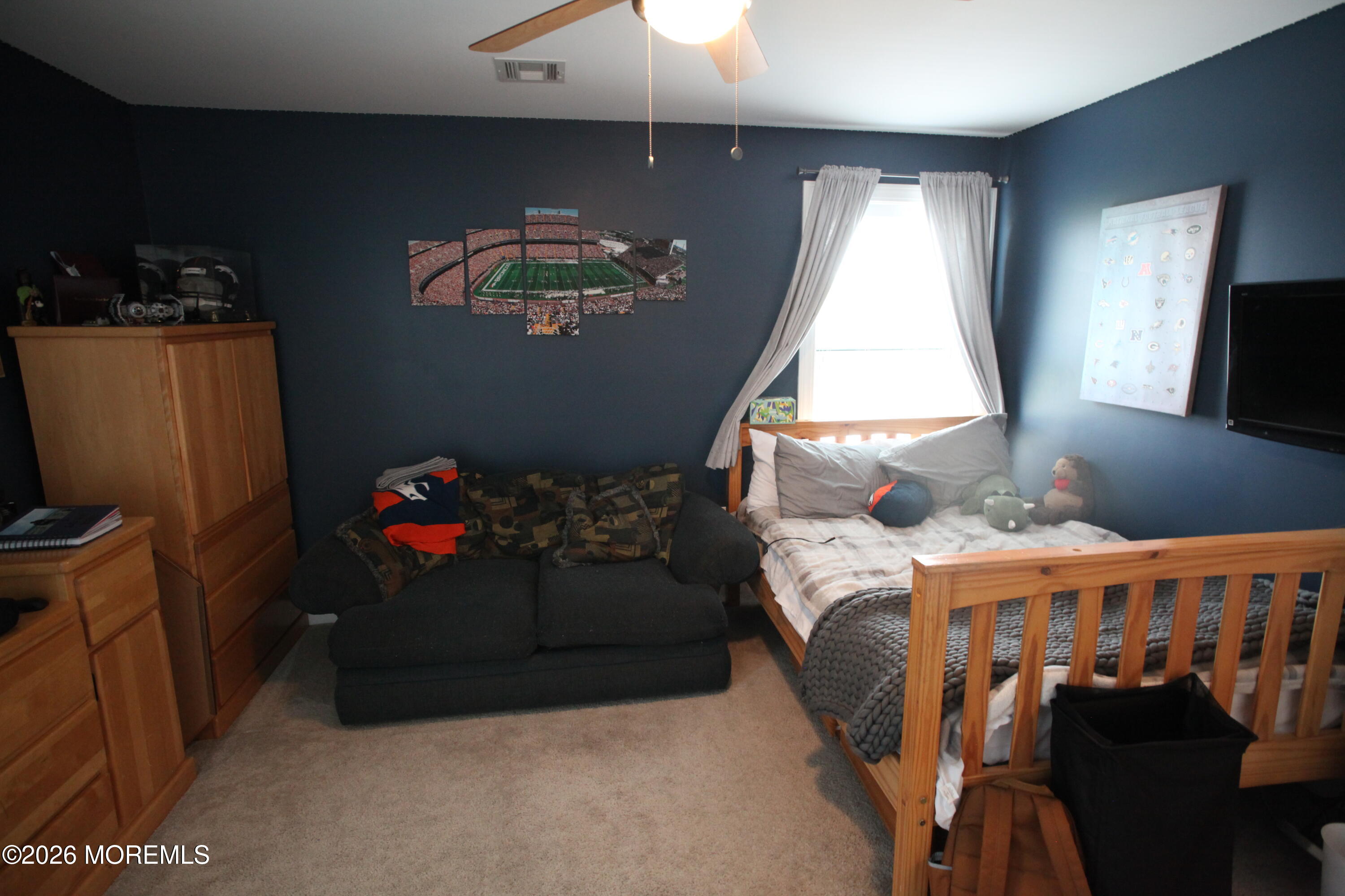 107 Waldron Road Toms River, NJ 08753 - Photo 10 of 20 a bedroom with furniture and a window