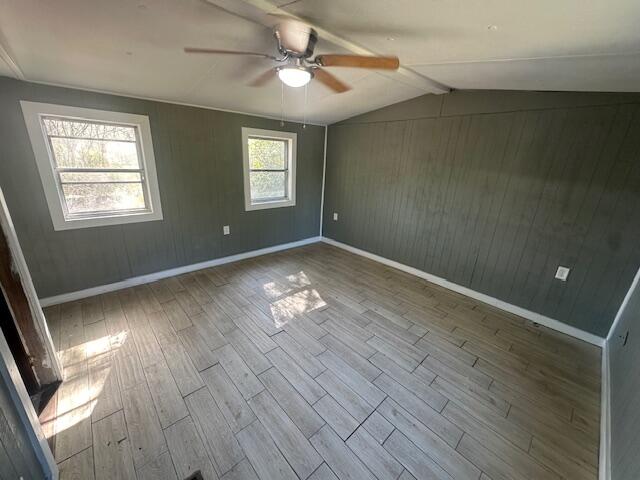 143 West Heather Avenue DeFuniak Springs, FL 32433 - Photo 20 of 20 an empty room with wooden floor and windows