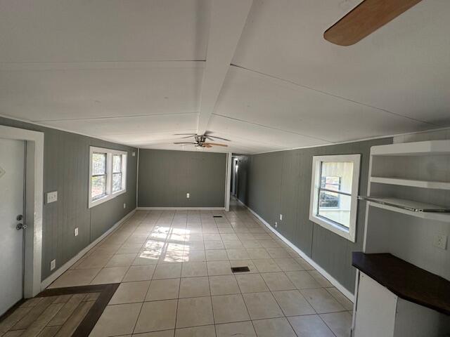 143 West Heather Avenue DeFuniak Springs, FL 32433 - Photo 8 of 20 a view of an empty room with window and chandelier fan