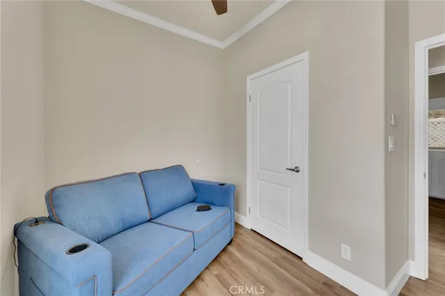 a living room with furniture and a gate