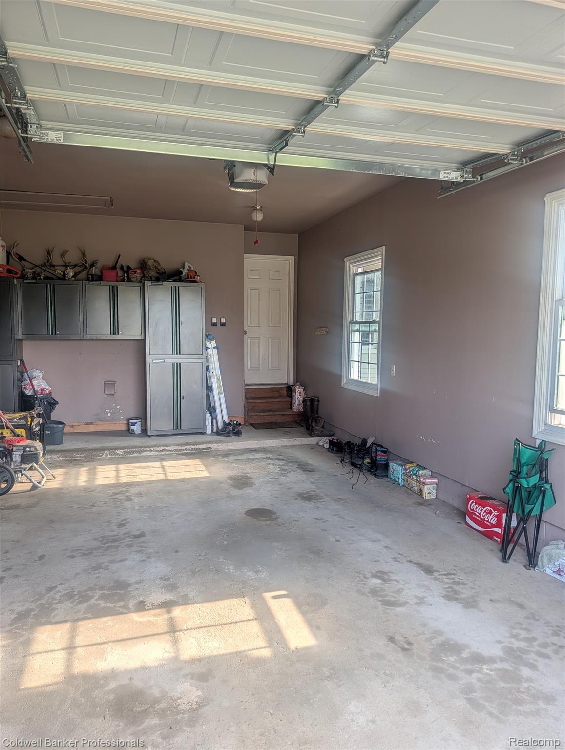 3210 South Kingston Road Kingston, MI 48741 - Photo 62 of 64 Garage featuring a garage door opener