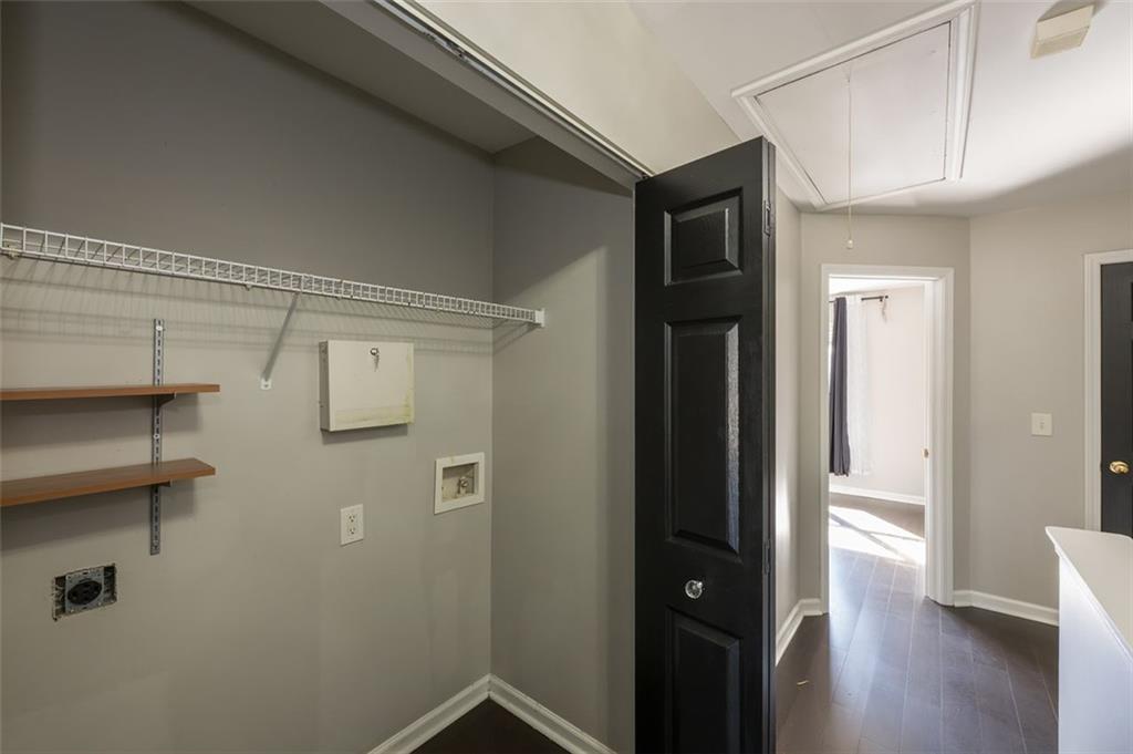 3177 Mill Springs Circle Northeast Buford, GA 30519 - Photo 19 of 27 a view of a hallway with wooden floor and closet