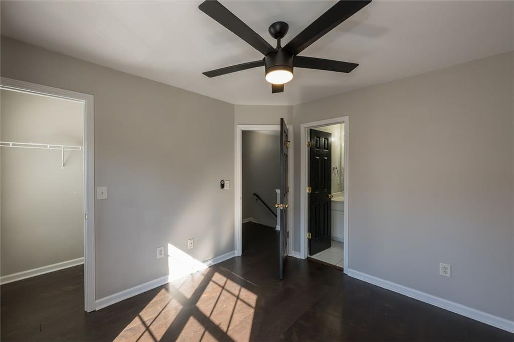 3177 Mill Springs Circle Northeast Buford, GA 30519 - Photo 21 of 27 wooden floor in an empty room