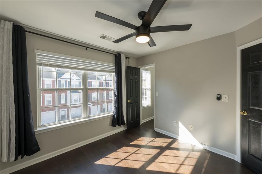 3177 Mill Springs Circle Northeast Buford, GA 30519 - Photo 22 of 27 a view of workspace with window and a ceiling fan