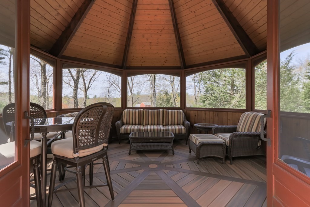 24 Whitney Road Shirley, MA 01464 - Photo 14 of 42 a view of a two chairs and table in the balcony
