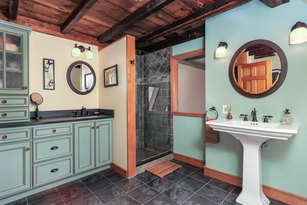 24 Whitney Road Shirley, MA 01464 - Photo 16 of 42 a bathroom with a sink and a mirror