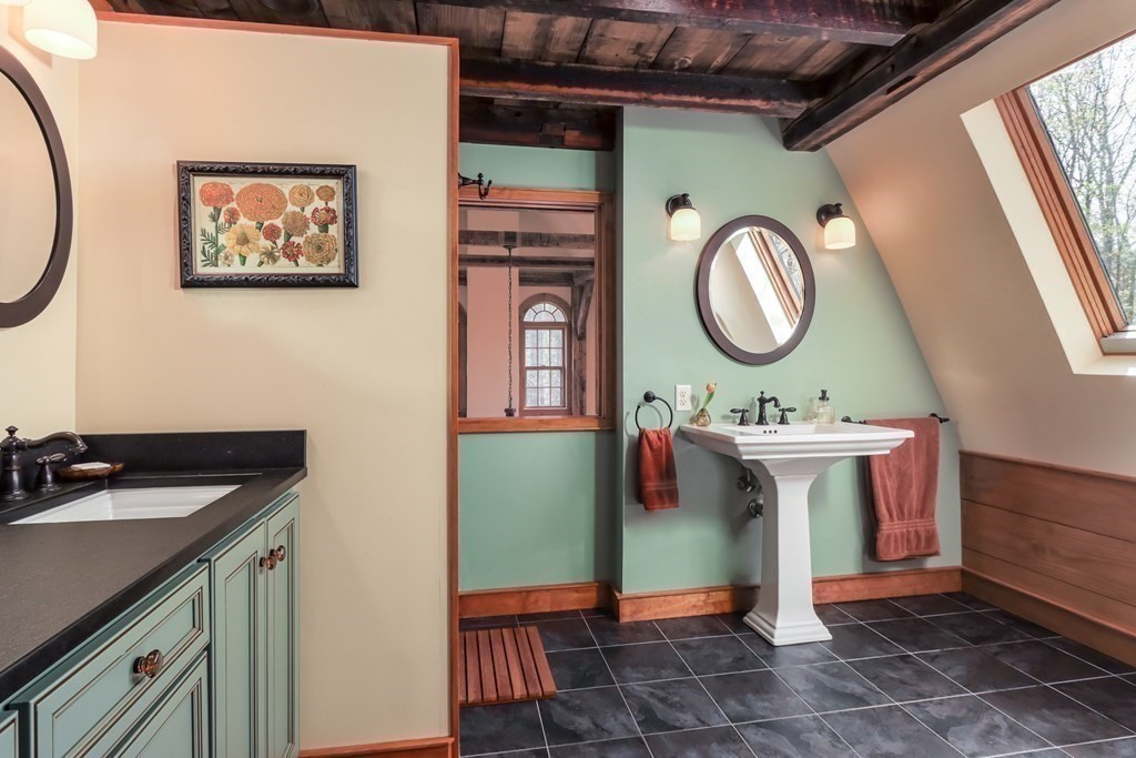 24 Whitney Road Shirley, MA 01464 - Photo 18 of 42 a bathroom with a sink and a mirror