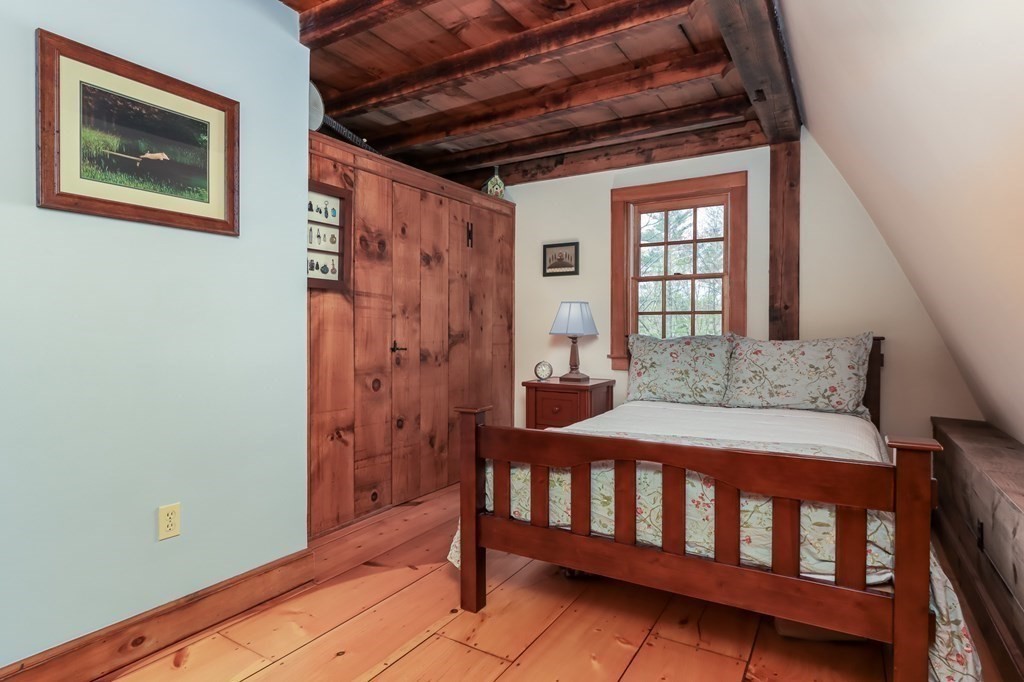 24 Whitney Road Shirley, MA 01464 - Photo 21 of 42 a bedroom with a bed and a window