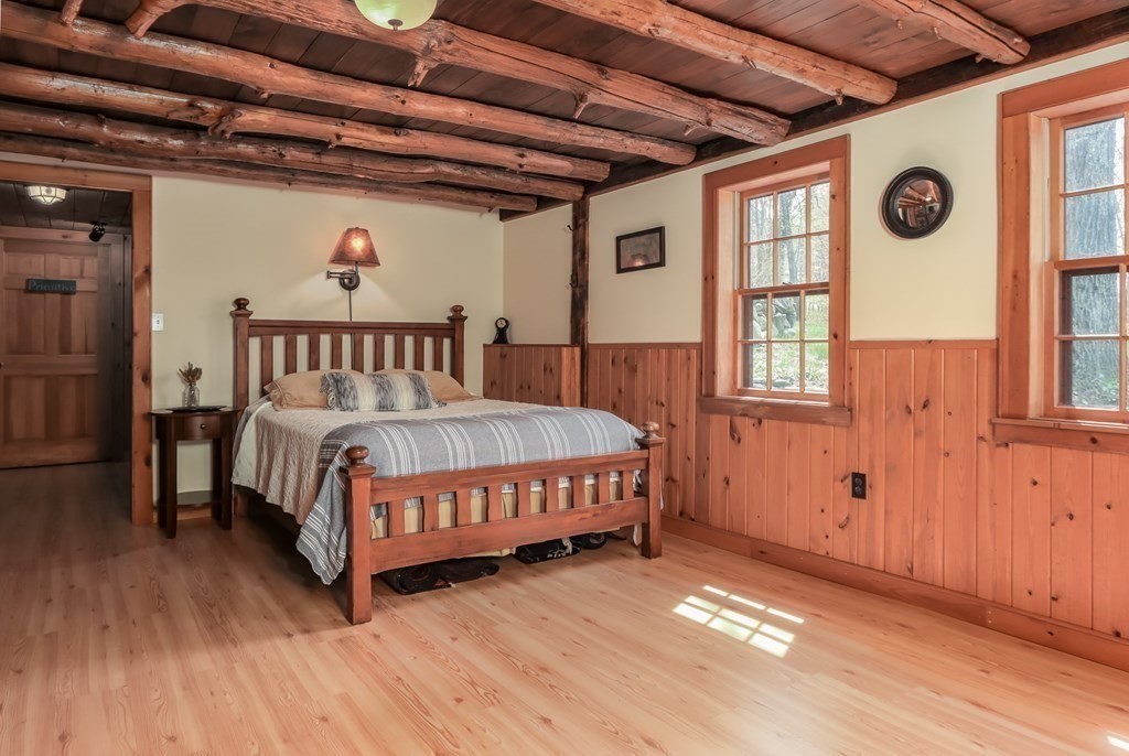 24 Whitney Road Shirley, MA 01464 - Photo 24 of 42 a bedroom with a bed and a window