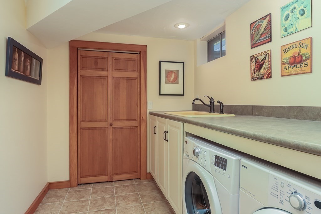 24 Whitney Road Shirley, MA 01464 - Photo 28 of 42 a utility room with dryer and washer
