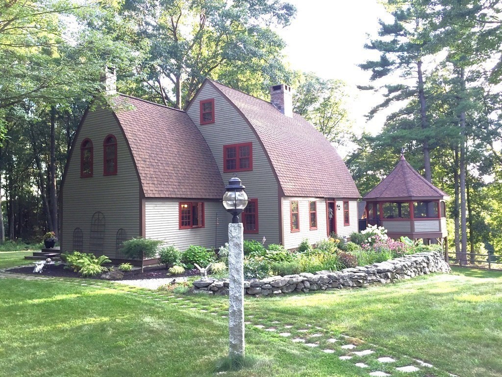 24 Whitney Road Shirley, MA 01464 - Photo 29 of 42 a front view of a house with a yard