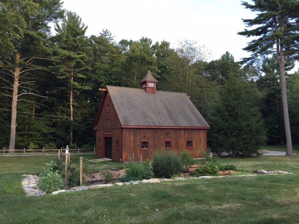 24 Whitney Road Shirley, MA 01464 - Photo 33 of 42 a aerial view of a house next to a big yard and large trees