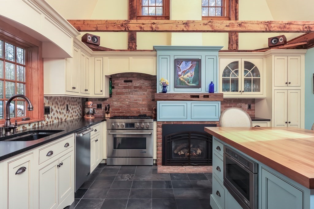 24 Whitney Road Shirley, MA 01464 - Photo 6 of 42 a kitchen with stainless steel appliances granite countertop a stove and a sink