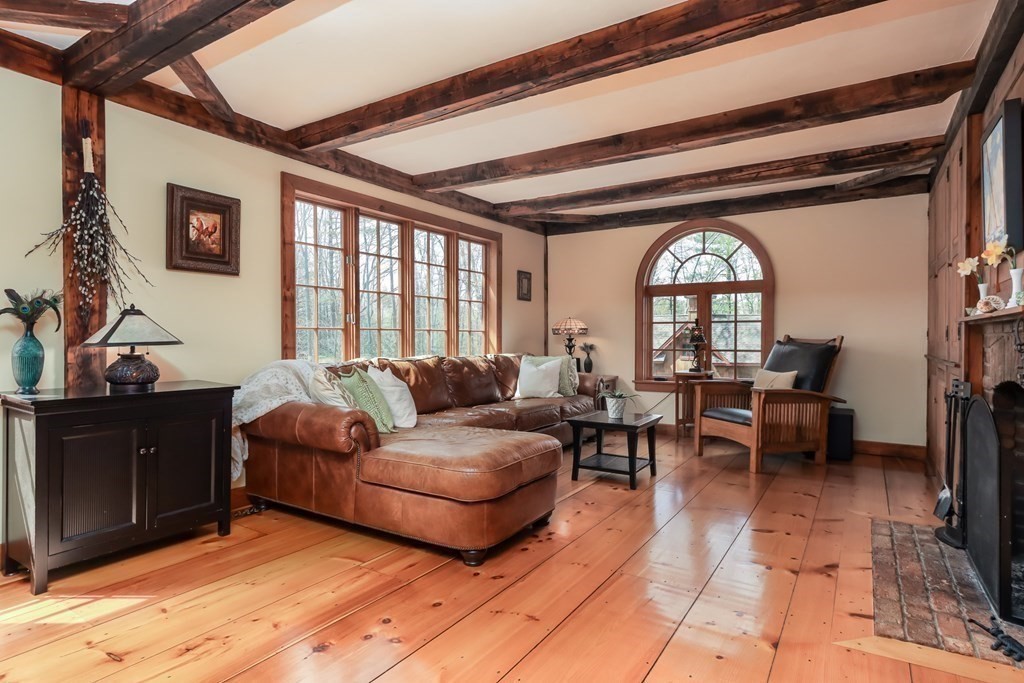 24 Whitney Road Shirley, MA 01464 - Photo 10 of 42 a living room with furniture and a large window