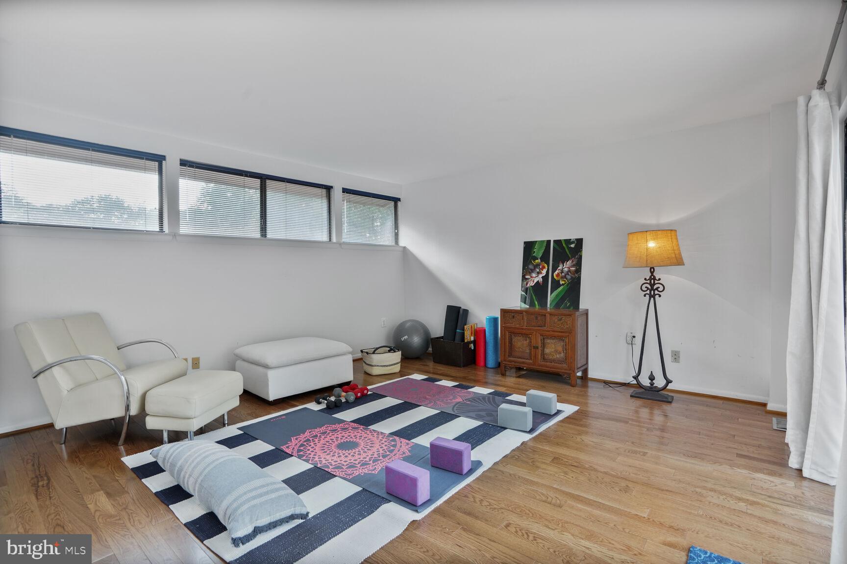 2034 Lakebreeze Way Reston, VA 20191 - Photo 46 of 66 a bed room with furniture and a window