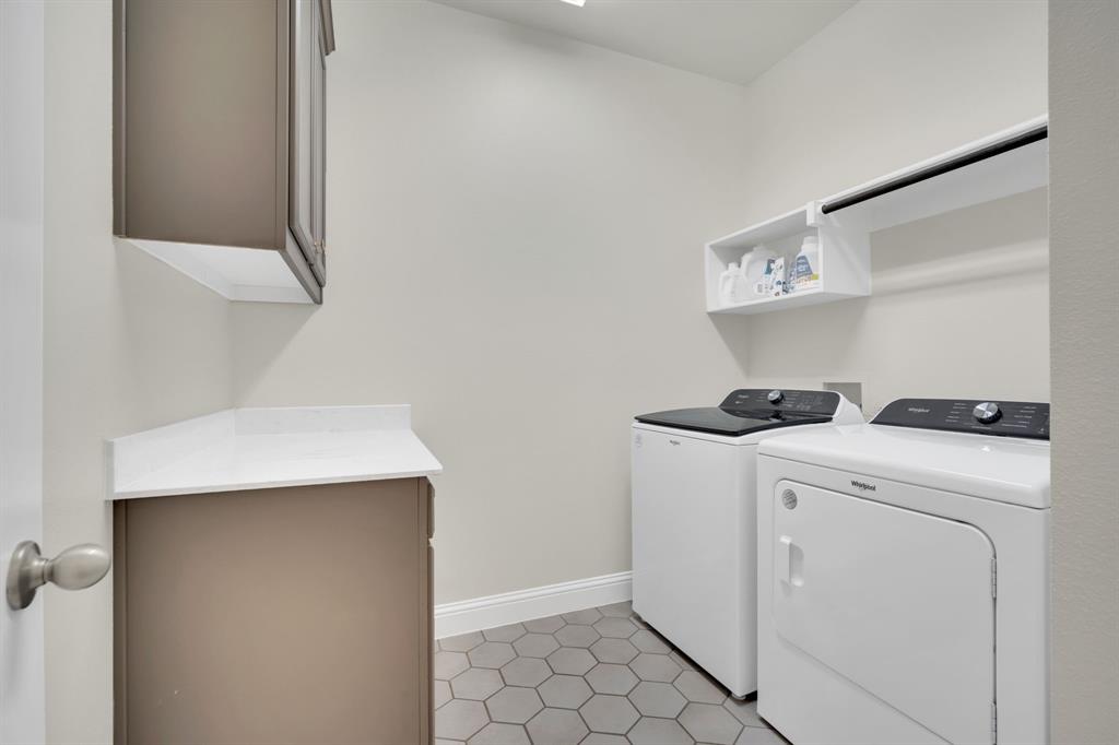 1601 Bear Path Way Gunter, TX 75058 - Photo 32 of 40 a utility room with dryer and washer