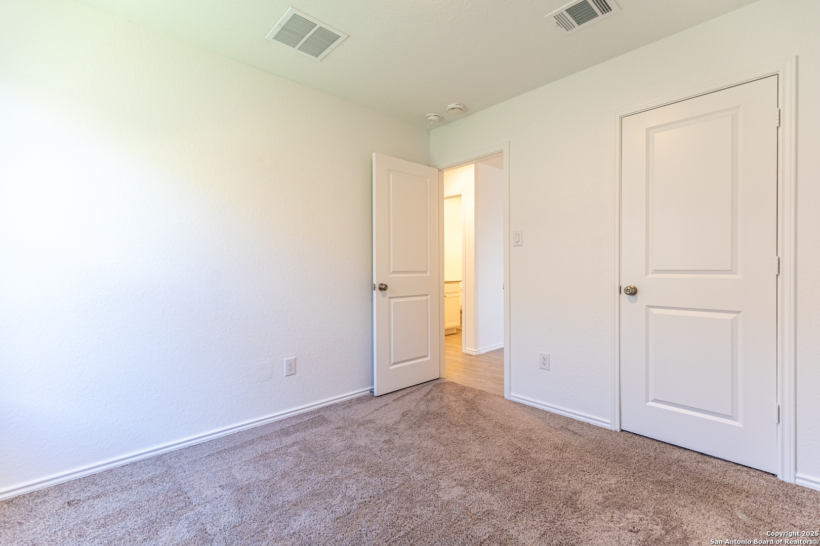 9143 Coronal Rings San Antonio, TX 78252 - Photo 14 of 30 a view of an empty room