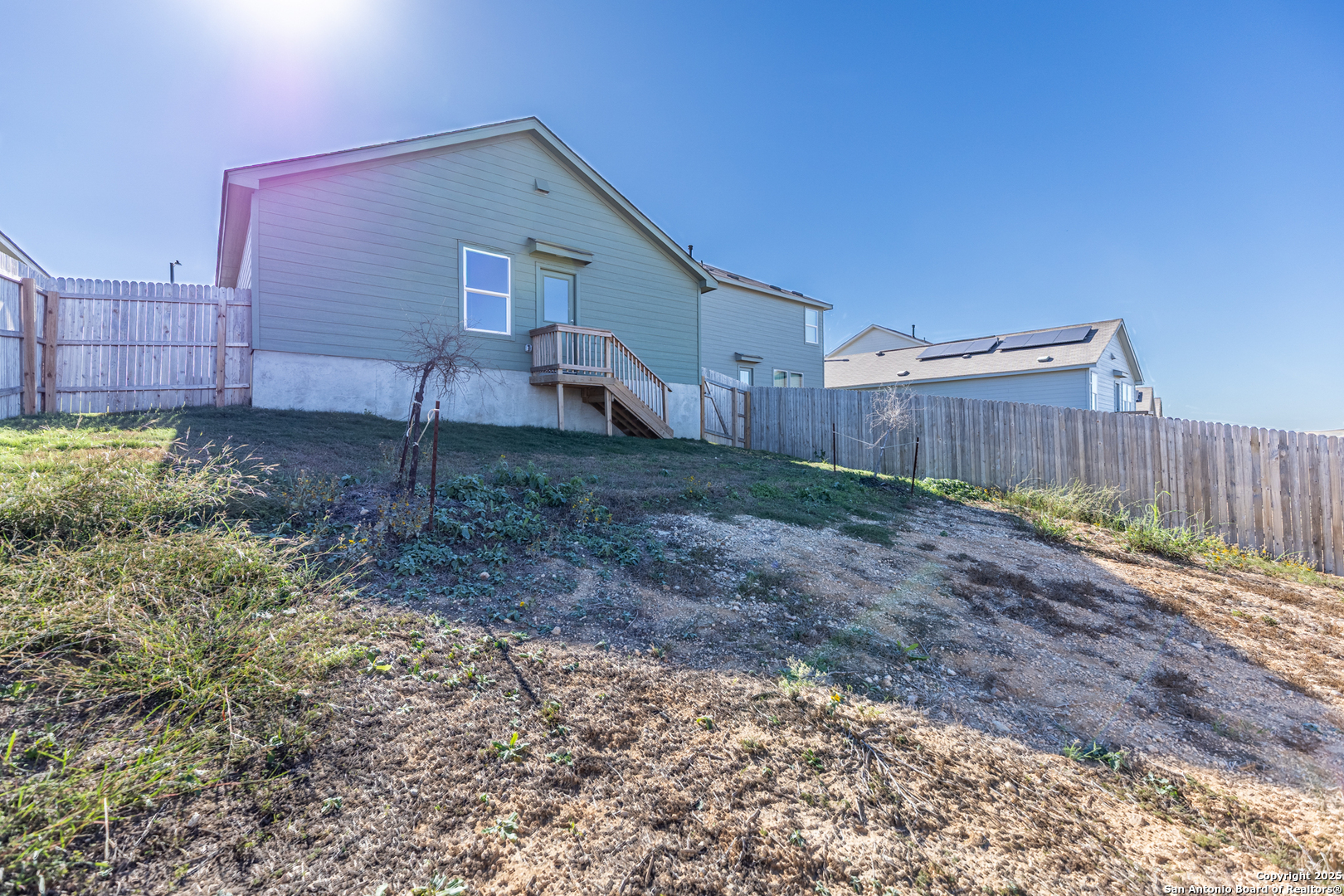 9143 Coronal Rings San Antonio, TX 78252 - Photo 27 of 30 a view of a backyard