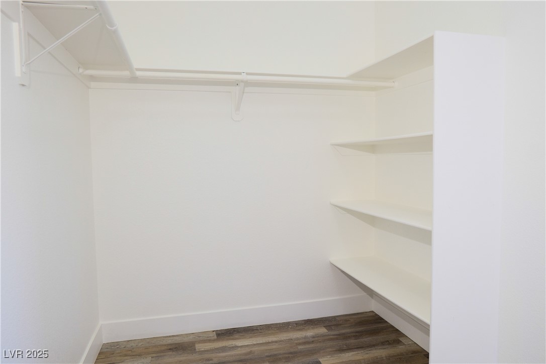 5400 Grain Mill Road Pahrump, NV 89061 - Photo 36 of 67 Spacious closet with dark wood-type flooring