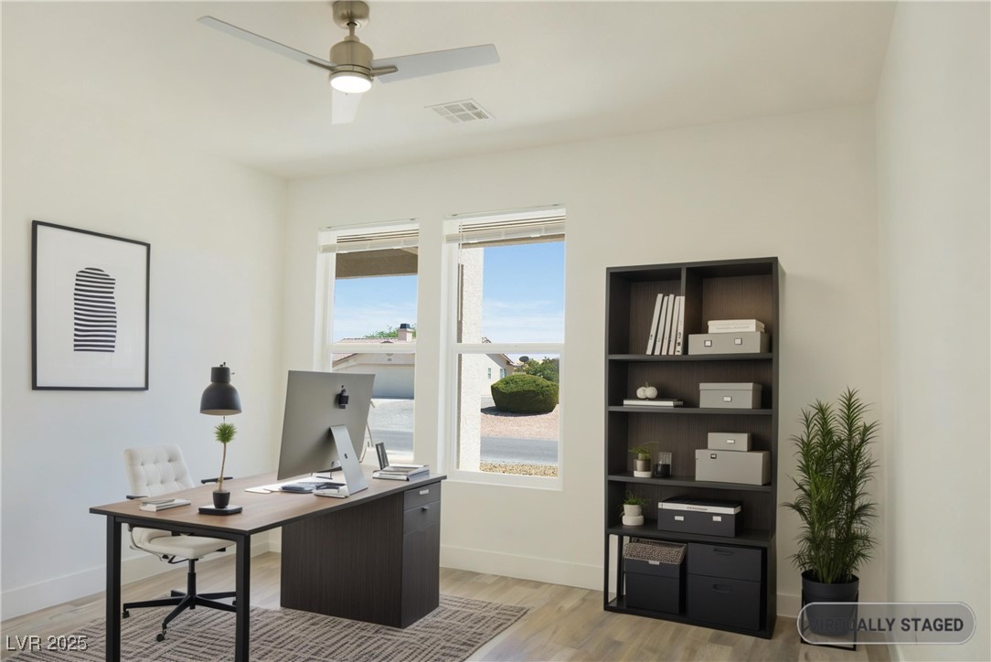 5400 Grain Mill Road Pahrump, NV 89061 - Photo 42 of 67 Office area with light wood-style flooring, baseboards, and ceiling fan