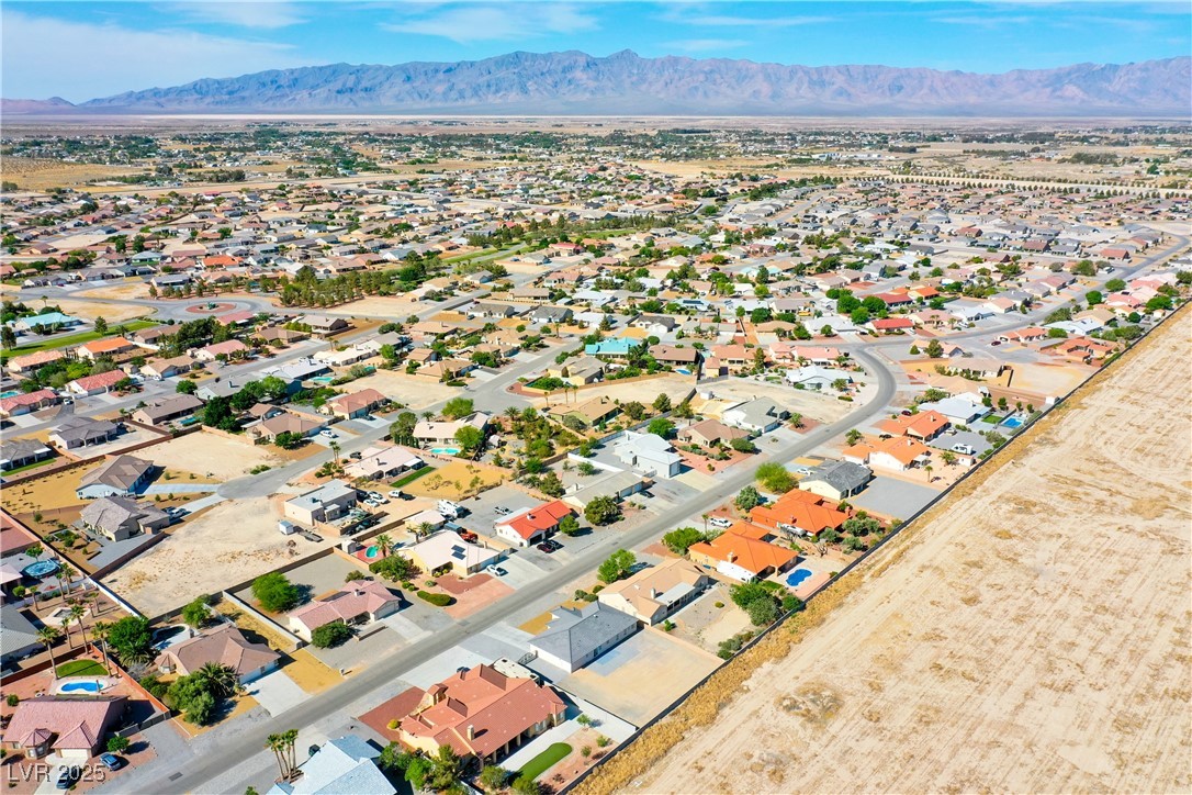 5400 Grain Mill Road Pahrump, NV 89061 - Photo 64 of 67 Bird's eye view of a mountain backdrop