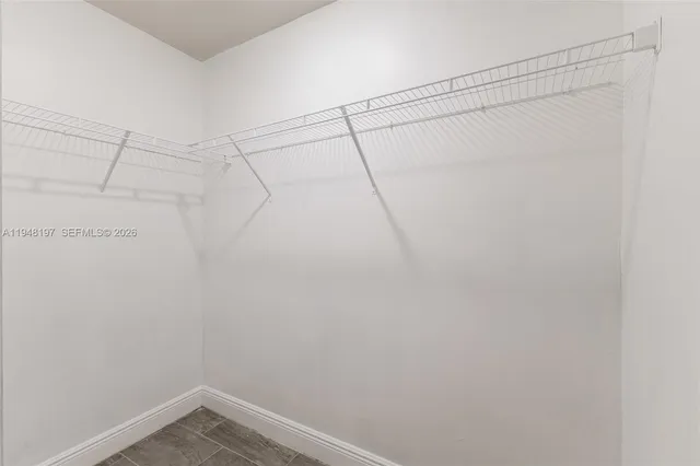 a view of a room with racks on the wall