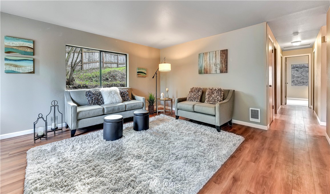 5529 Lowell Road Everett, WA 98203 - Photo 5 of 22 a living room with furniture and a large window
