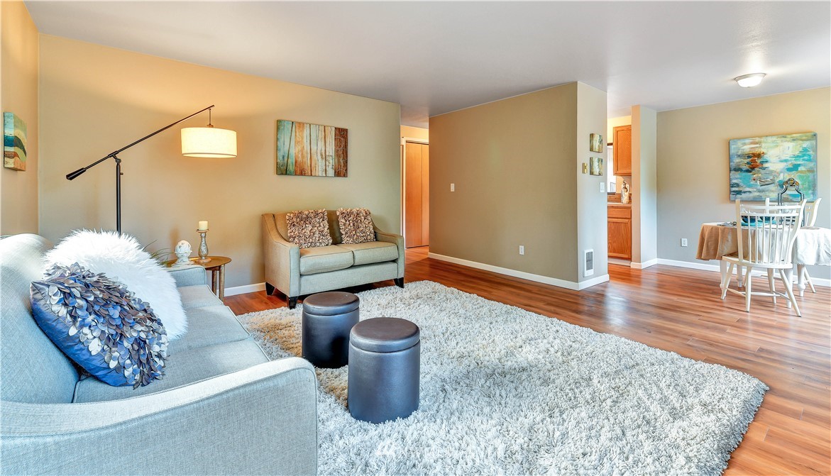 5529 Lowell Road Everett, WA 98203 - Photo 6 of 22 a living room with furniture and a wooden floor