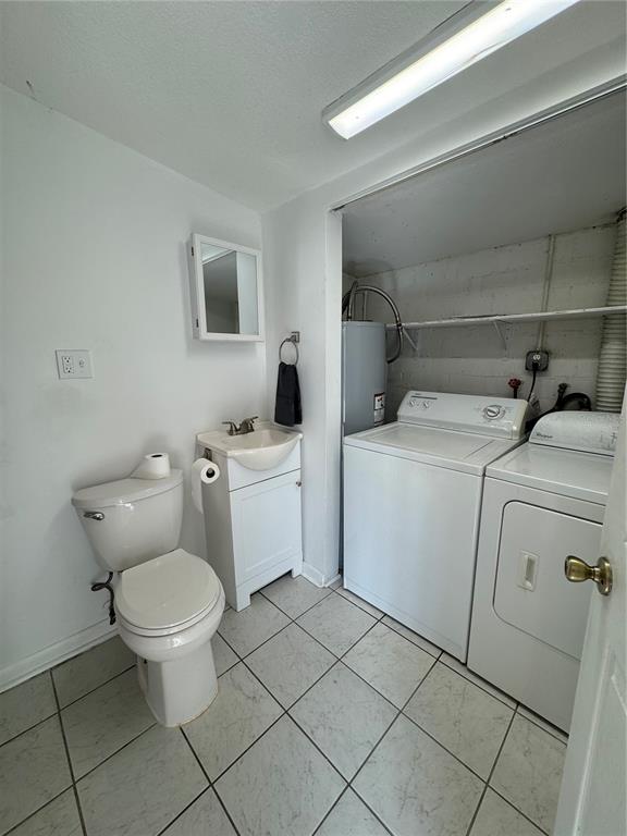 302 West Wall Street Frostproof, FL 33843 - Photo 17 of 37 a view of a bathroom with a sink and a toilet