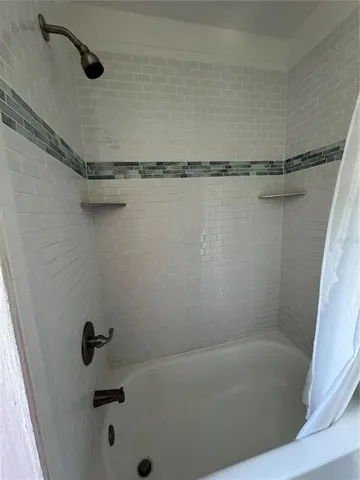 a bathroom with a bathtub