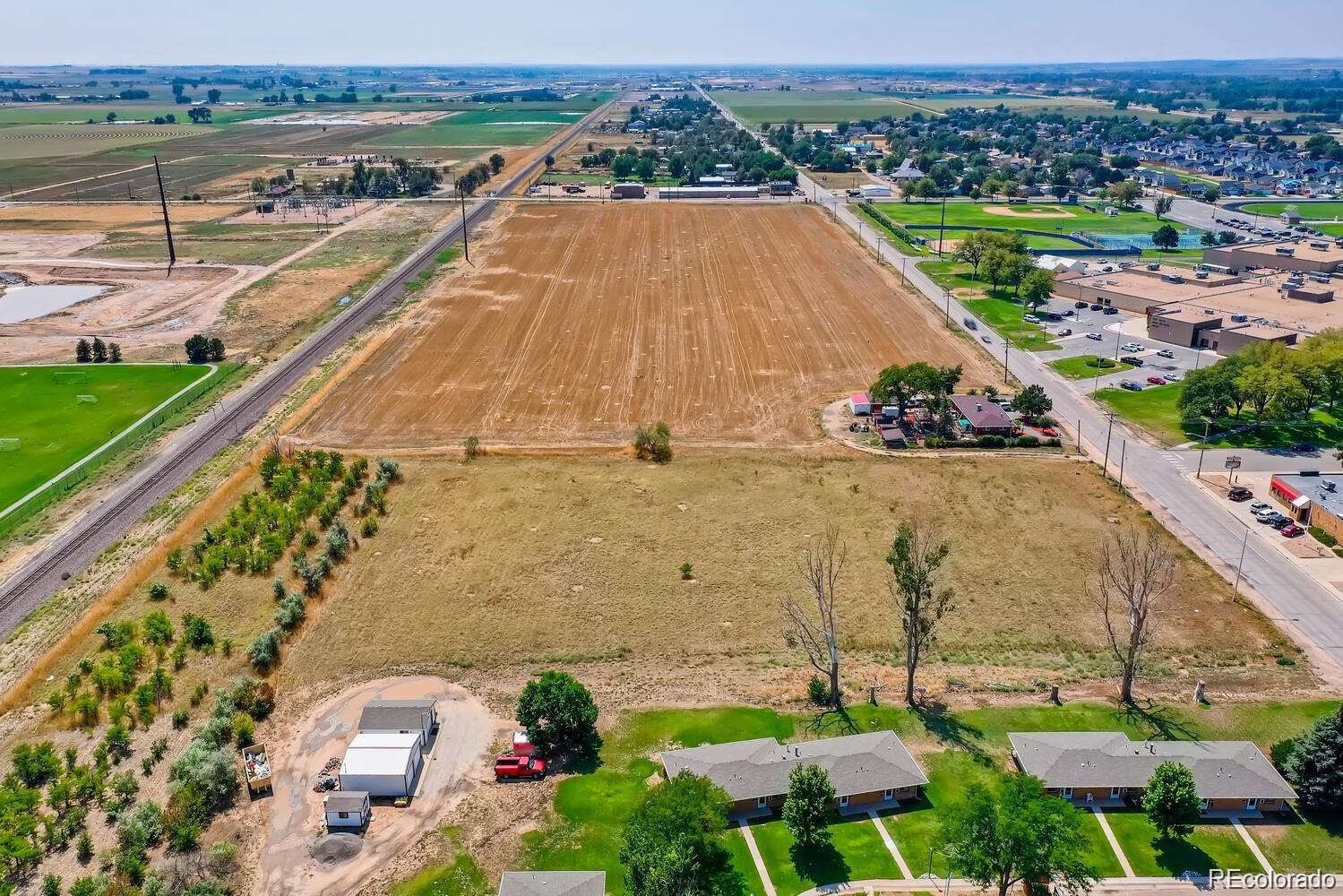 South Denver Avenue Fort Lupton, CO 80621 - Photo 4 of 11 an aerial view of a house