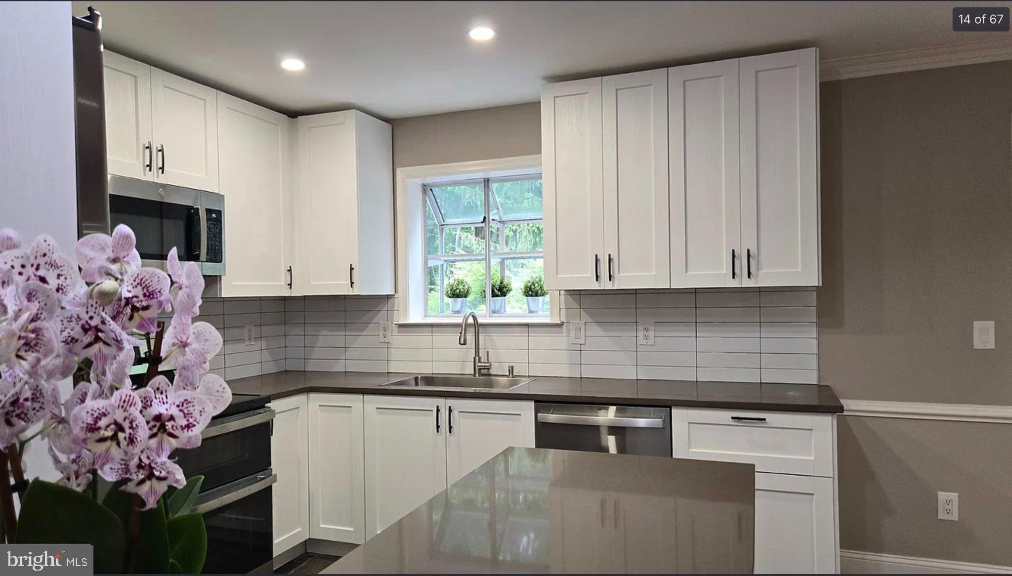 3906 Valley Ridge Drive Fairfax, VA 22033 - Photo 14 of 58 Modern kitchen with elegant finishes.