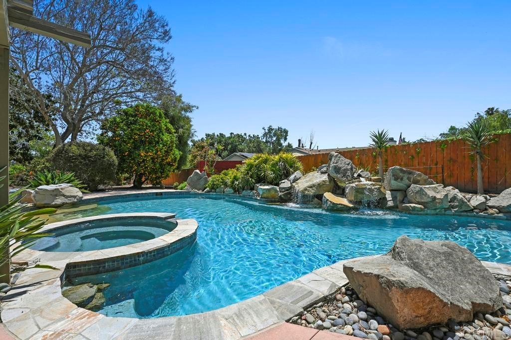 546 Rancho Santa Fe Road Encinitas, CA 92024 - Photo 32 of 48 a view of a swimming pool with a yard
