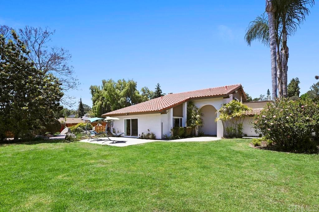 546 Rancho Santa Fe Road Encinitas, CA 92024 - Photo 35 of 48 a front view of house with yard and green space