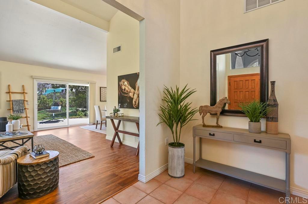 546 Rancho Santa Fe Road Encinitas, CA 92024 - Photo 4 of 48 a living room with furniture and a large window