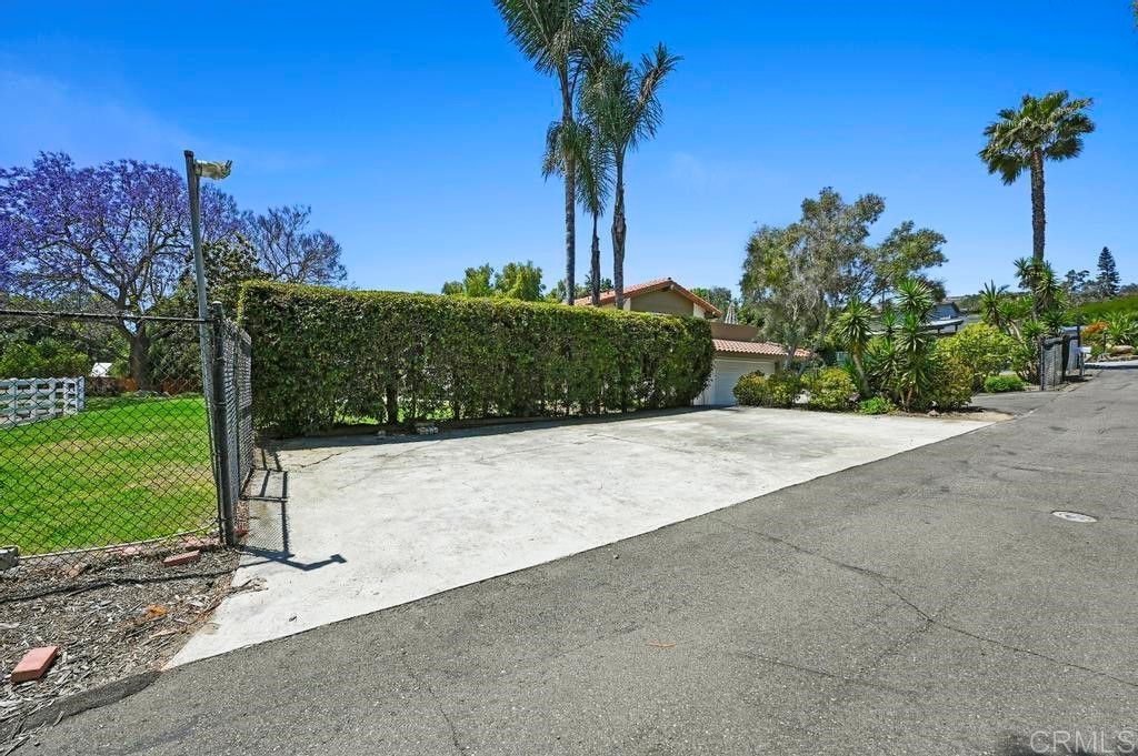 546 Rancho Santa Fe Road Encinitas, CA 92024 - Photo 43 of 48 a view of a garden with a tree