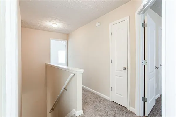 a view of hallway with stairs